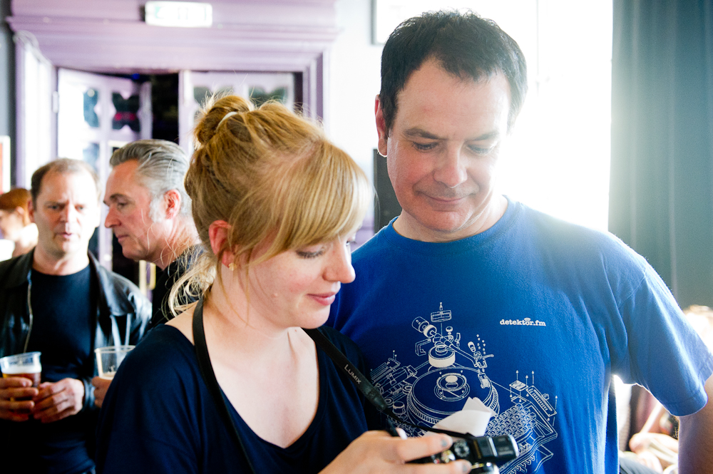 David Gedge with Jessica McMillan looking at Summer Camp photos @ Concorde 2, Brighton, Sussex, England. Sun, 28 Aug., 2011. 
(c) 2011 Auwyn.com All Rights Reserved