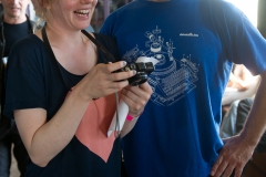 David Gedge with Jessica McMillan looking at Summer Camp photos @ Concorde 2, Brighton, Sussex, England. Sun, 28 Aug., 2011. 
(c) 2011 Auwyn.com All Rights Reserved