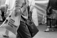 Shopper @ Lewes Farmers Market, Lewes, Sussex, England. Sat, 6 Aug., 2011. 
(c) 2011 Auwyn.com All Rights Reserved